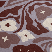 Patterned fabric with brown and white floral design on a gray background