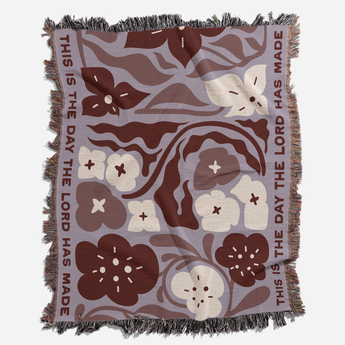 Floral patterned blanket with text on a white background