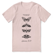 Christian t-shirt with the phrase “Created with a Purpose – Masterpiece in Motion”; soft unisex cotton tee affirming God’s design and calling based on Ephesians 2:10.
