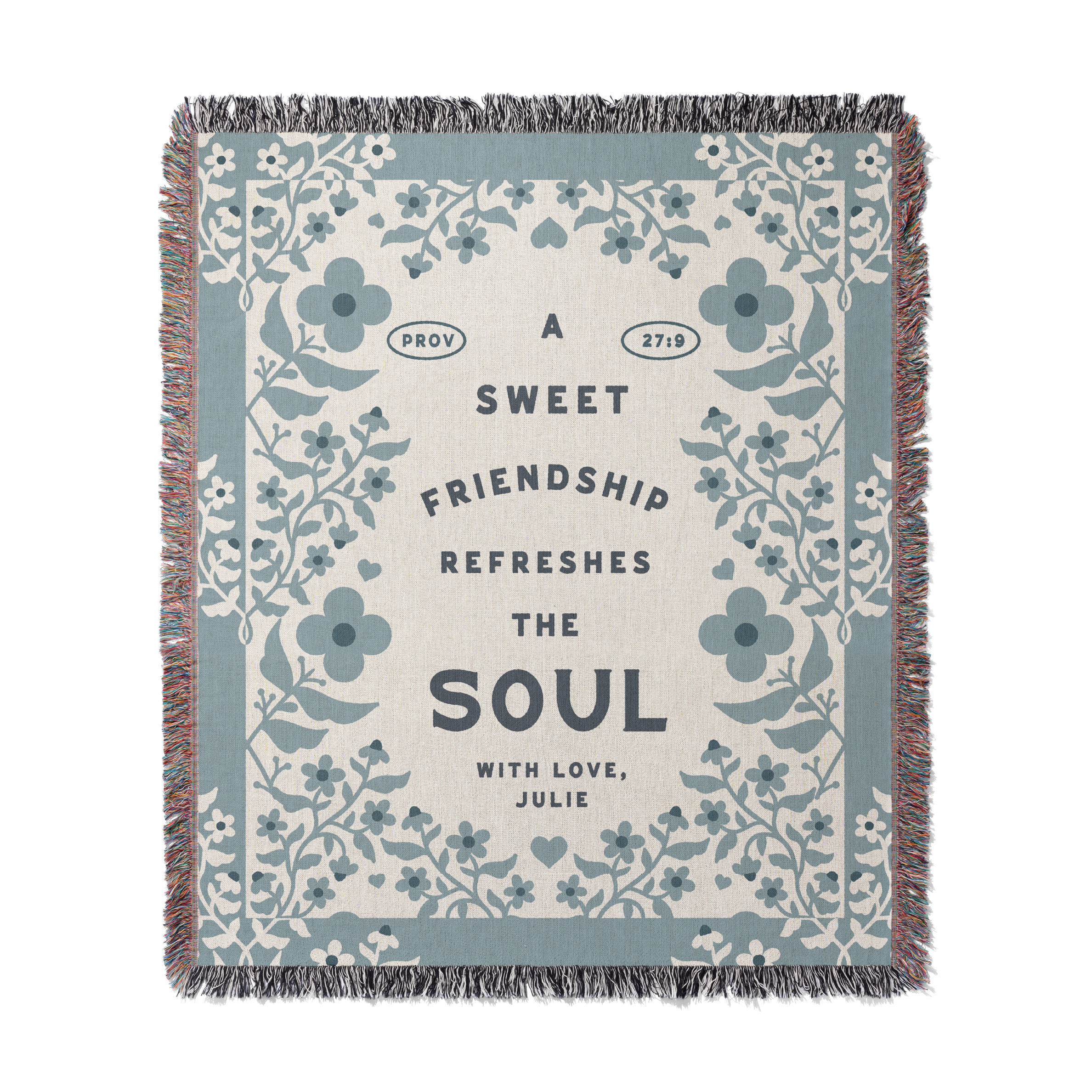 Floral-patterned blanket with text on a white background