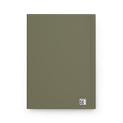 Plain green notebook with a QR code on a white background