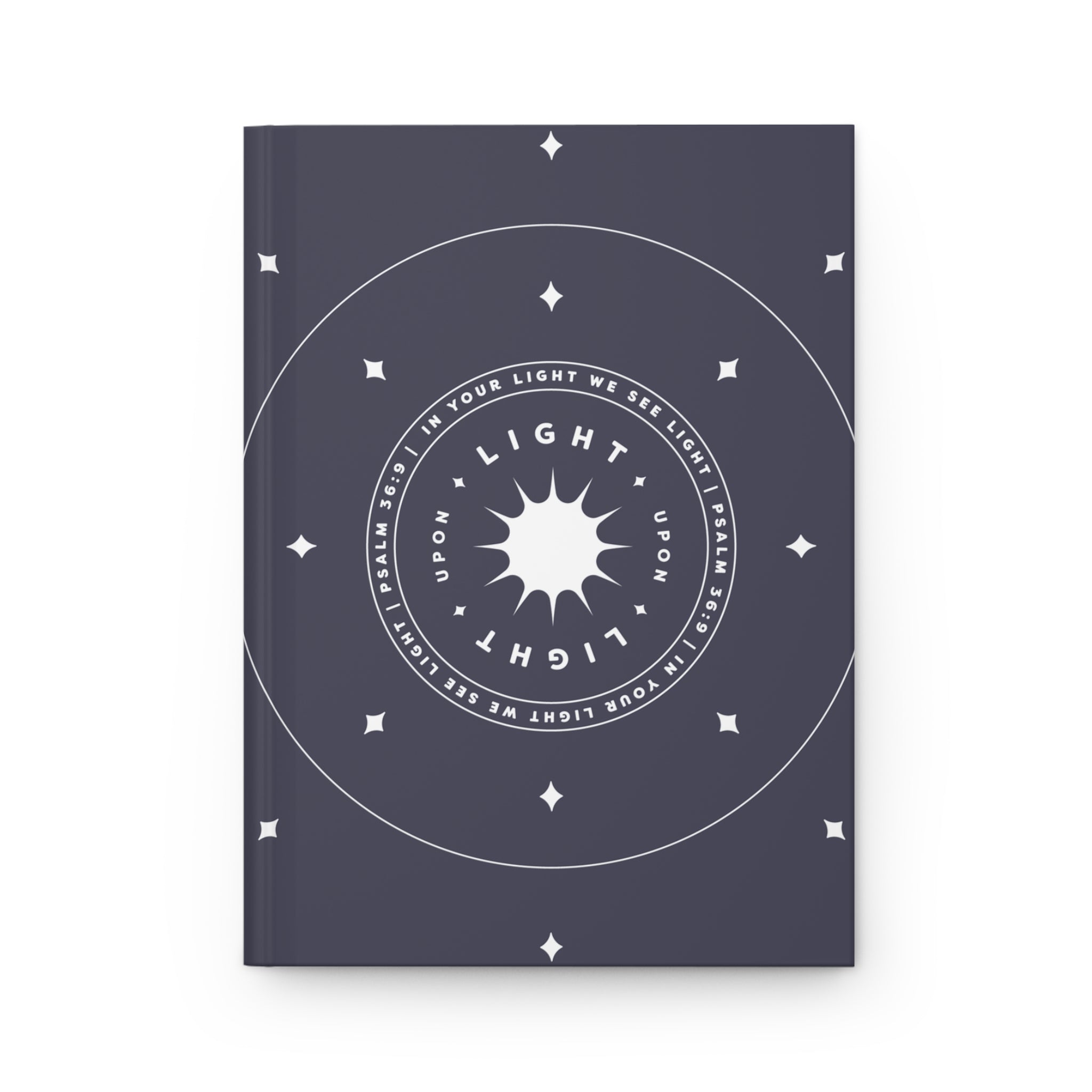 Notebook with circular design and text on a white background