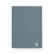 Plain blue notebook with a QR code on a white background