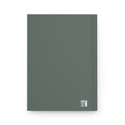 Green notebook with a QR code on a white background