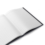 Open notebook with lined pages on a white background