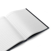 Open notebook with lined pages on a white background