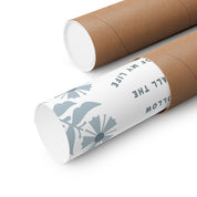 Two cardboard tubes with white labels featuring floral designs and text on a white background