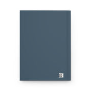 Blue notebook with a QR code on a white background