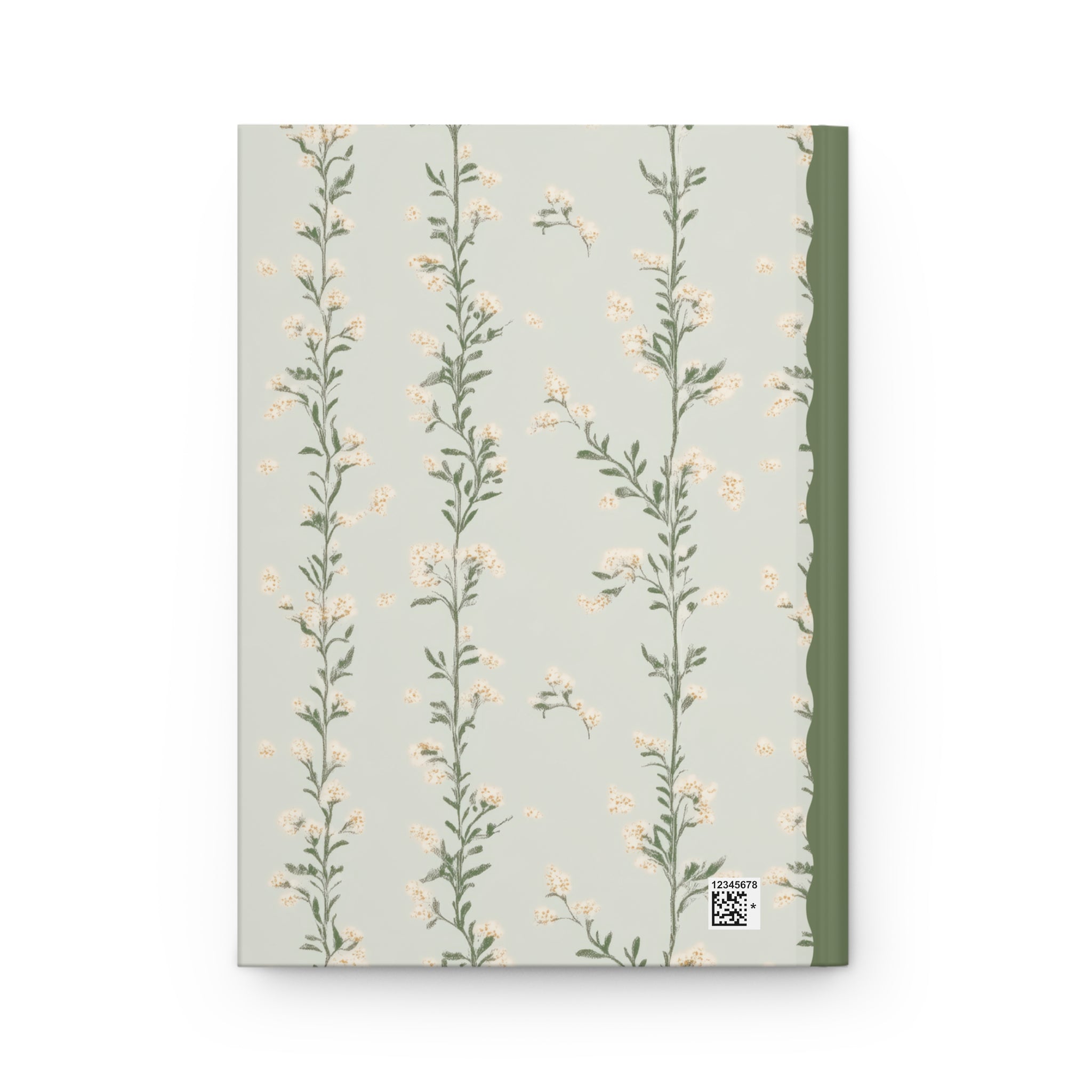 Notebook with floral design on a light gray background