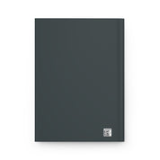 Dark gray notebook with a QR code on a white background