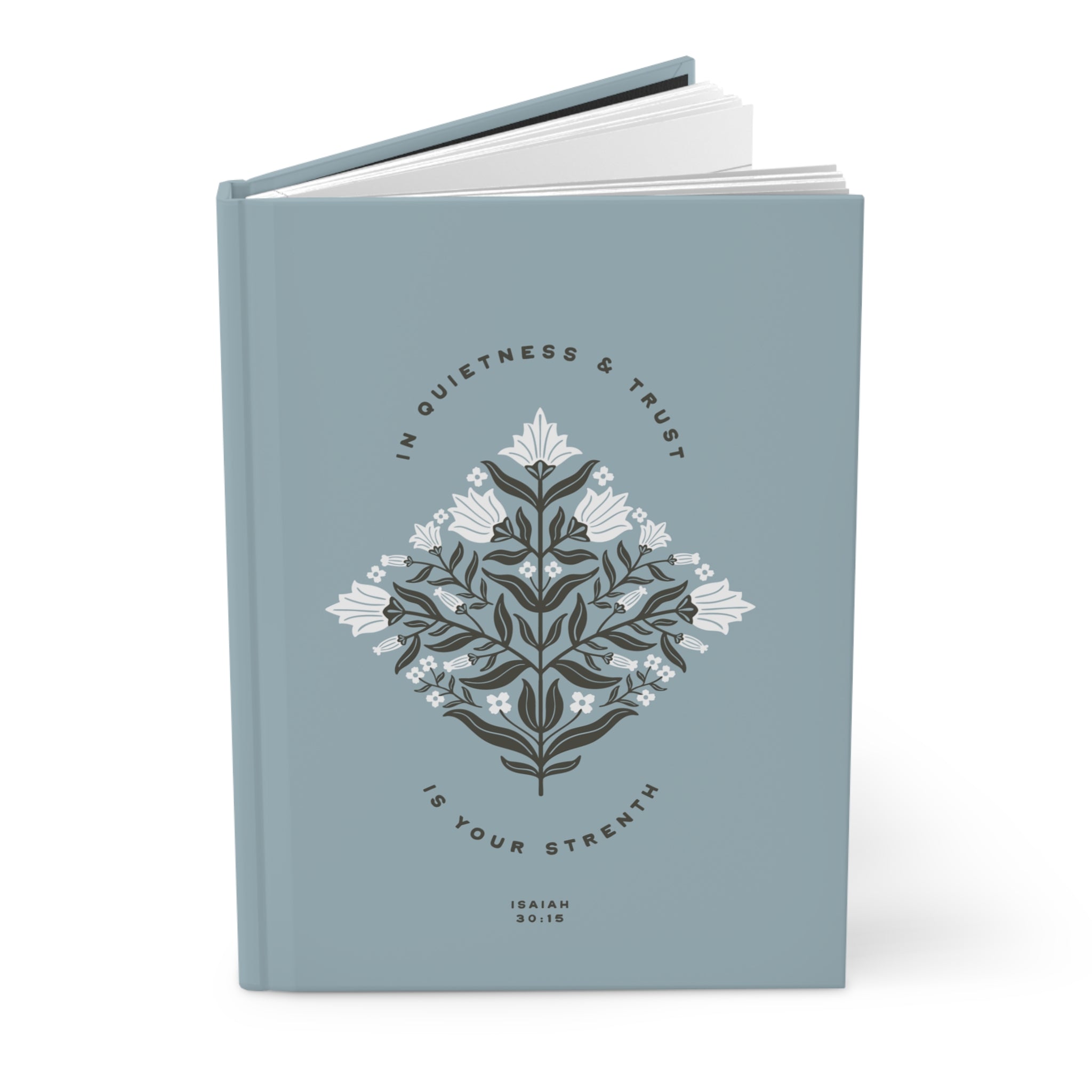 Blue notebook with floral design and text on a white background