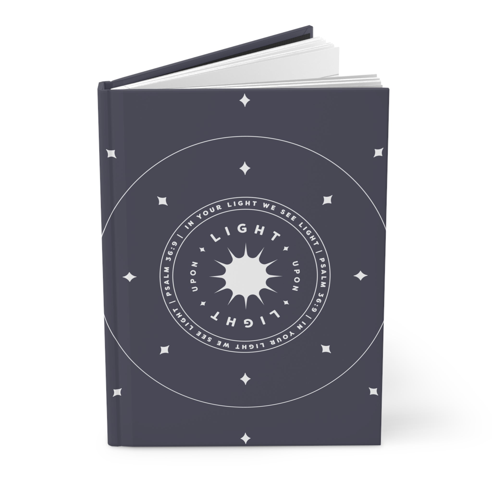 Dark blue notebook with white circular design and text on a white background