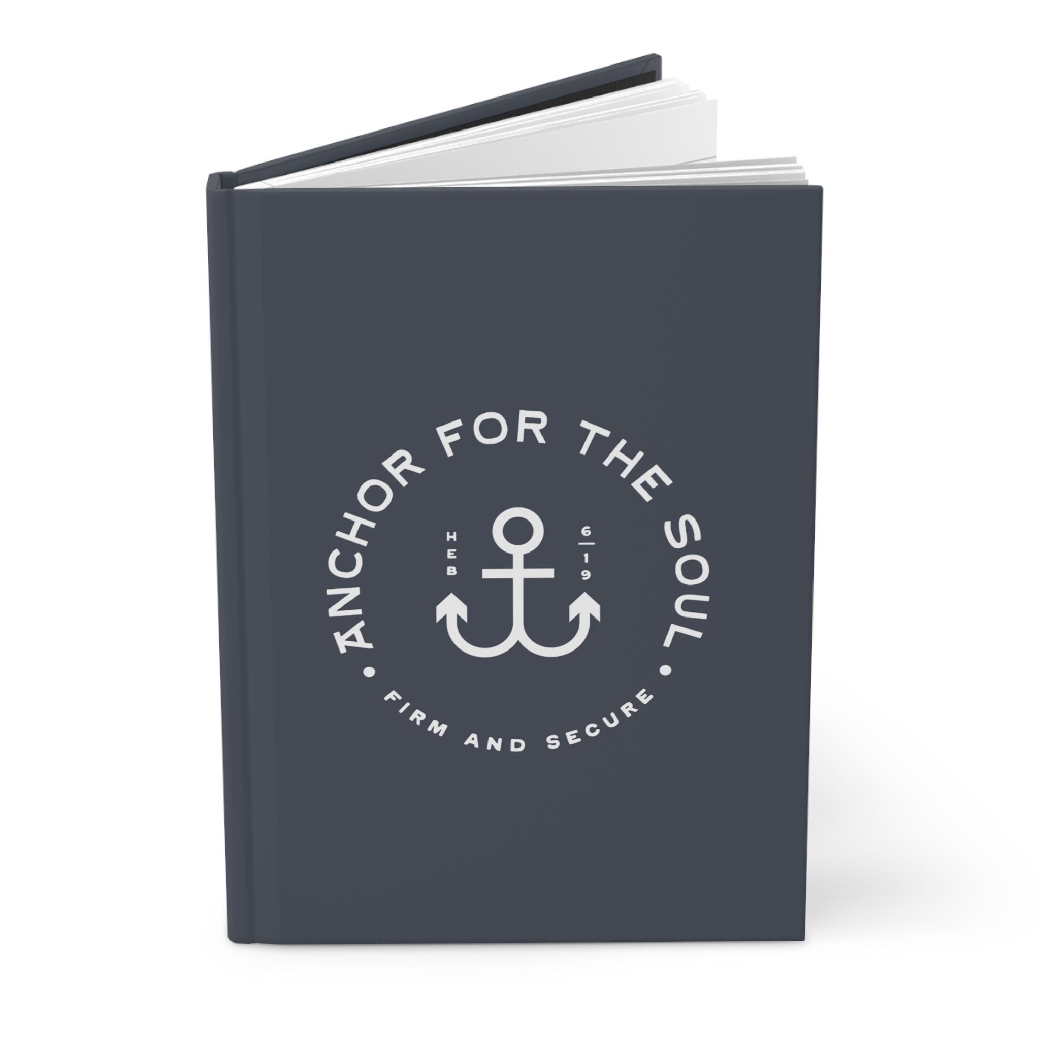 Dark blue notebook with white anchor design and text on a white background