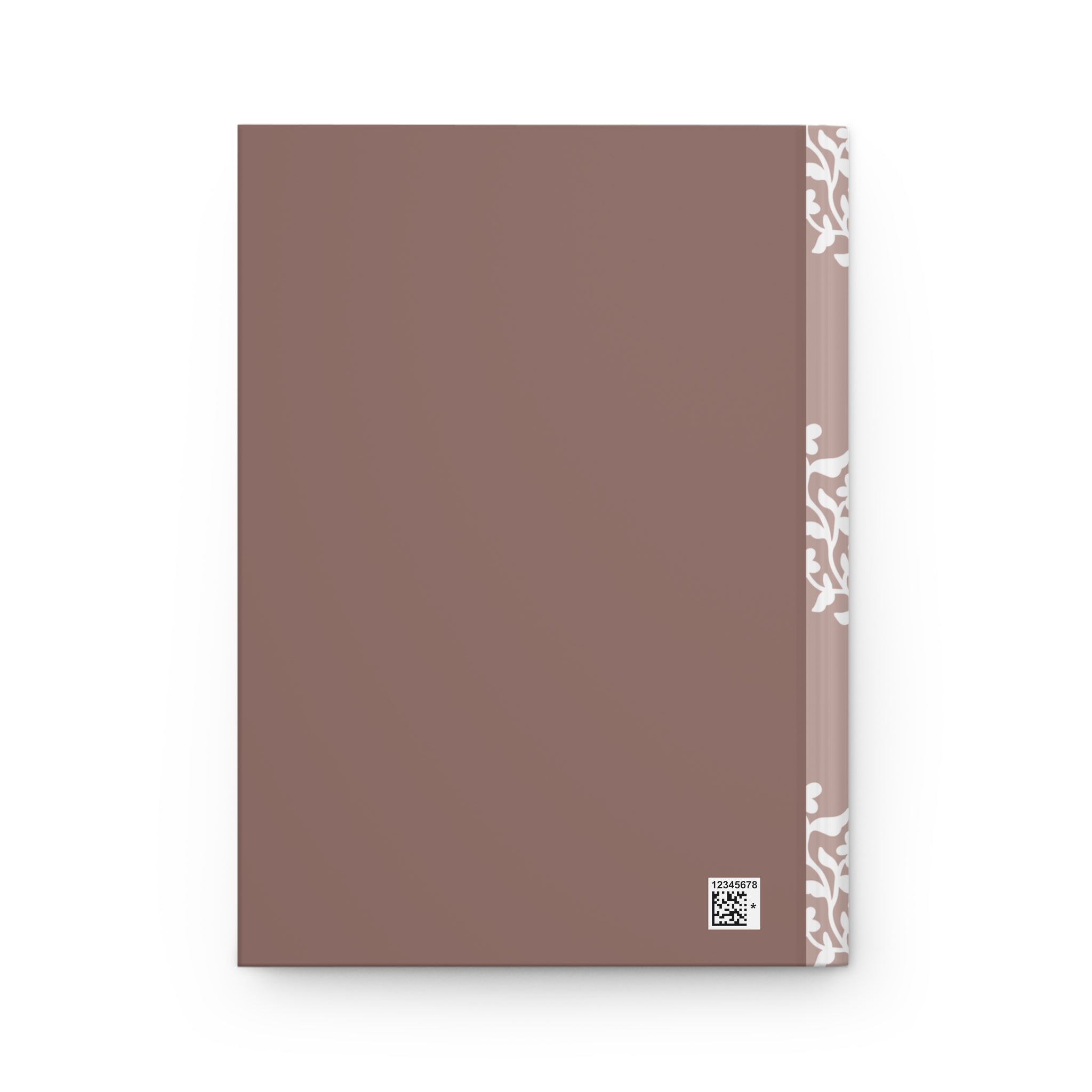 Brown notebook with white patterned edge on a white background