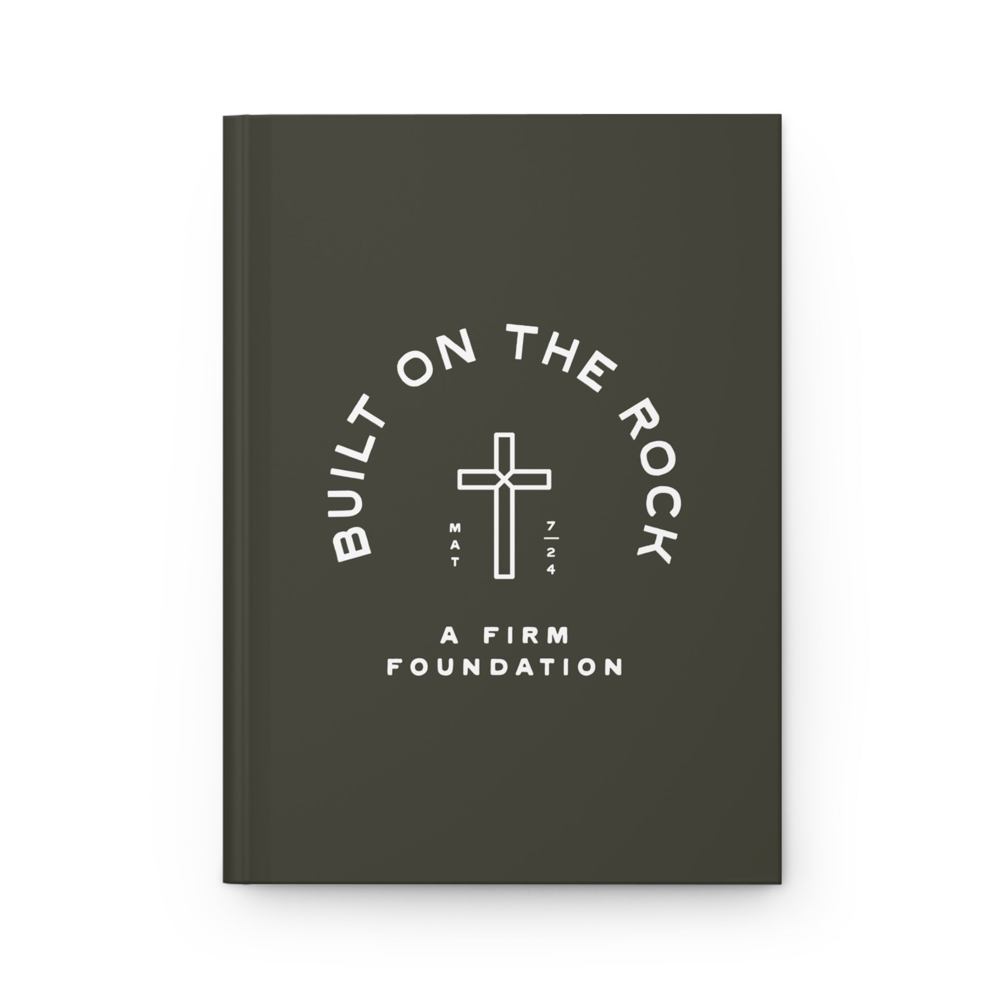 Dark gray notebook with white text and cross symbol on a white background