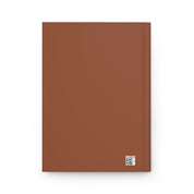 Brown notebook with a QR code on a white background
