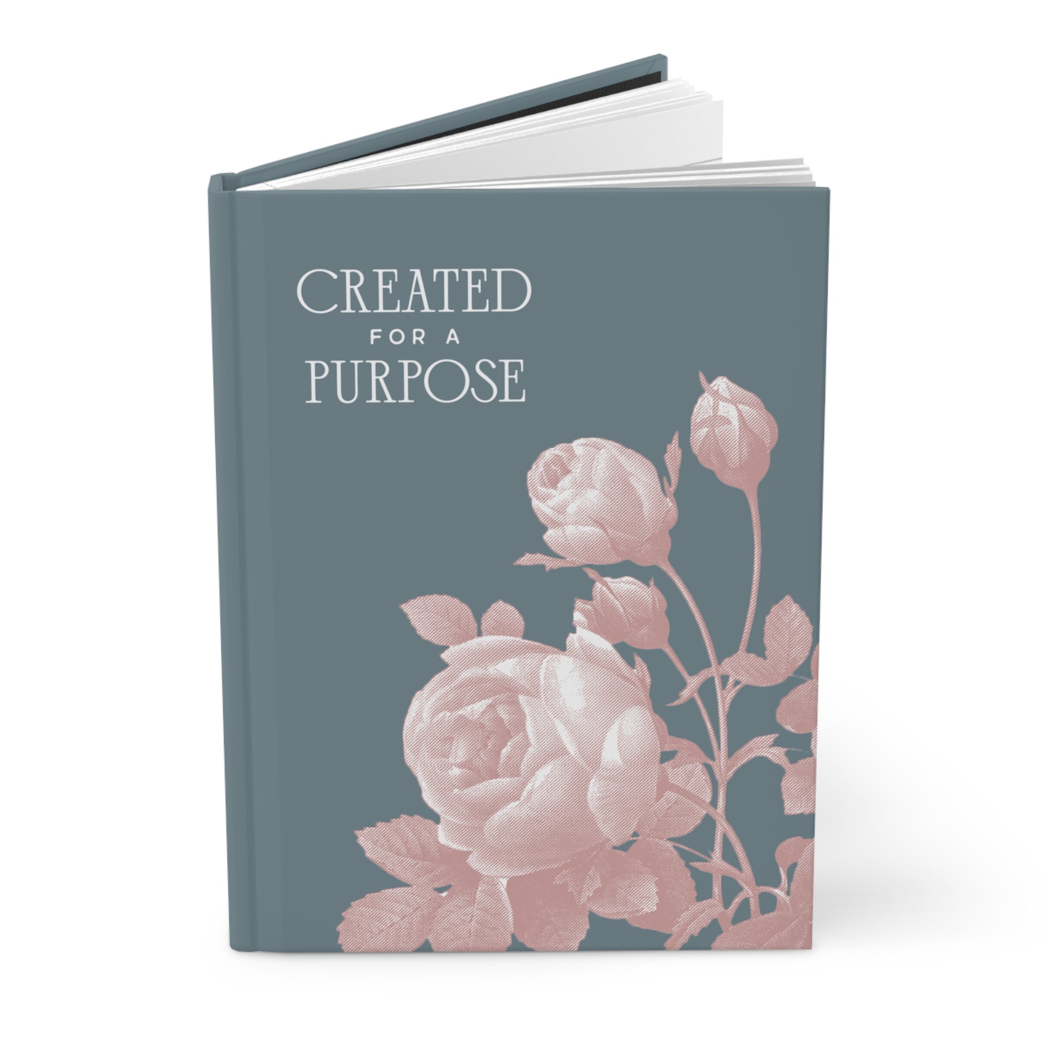 Book with floral design and 'Created for a Purpose' text on a white background