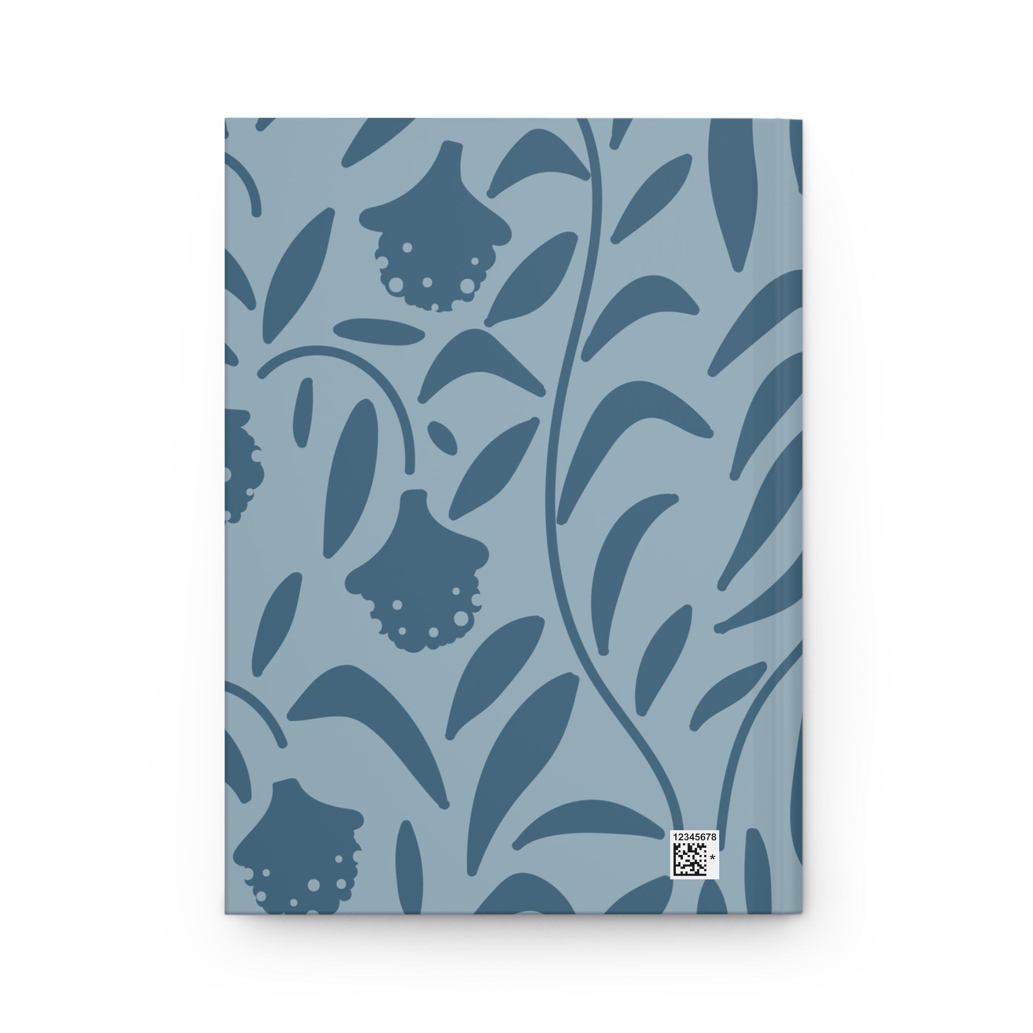 Notebook with blue floral pattern on a white background