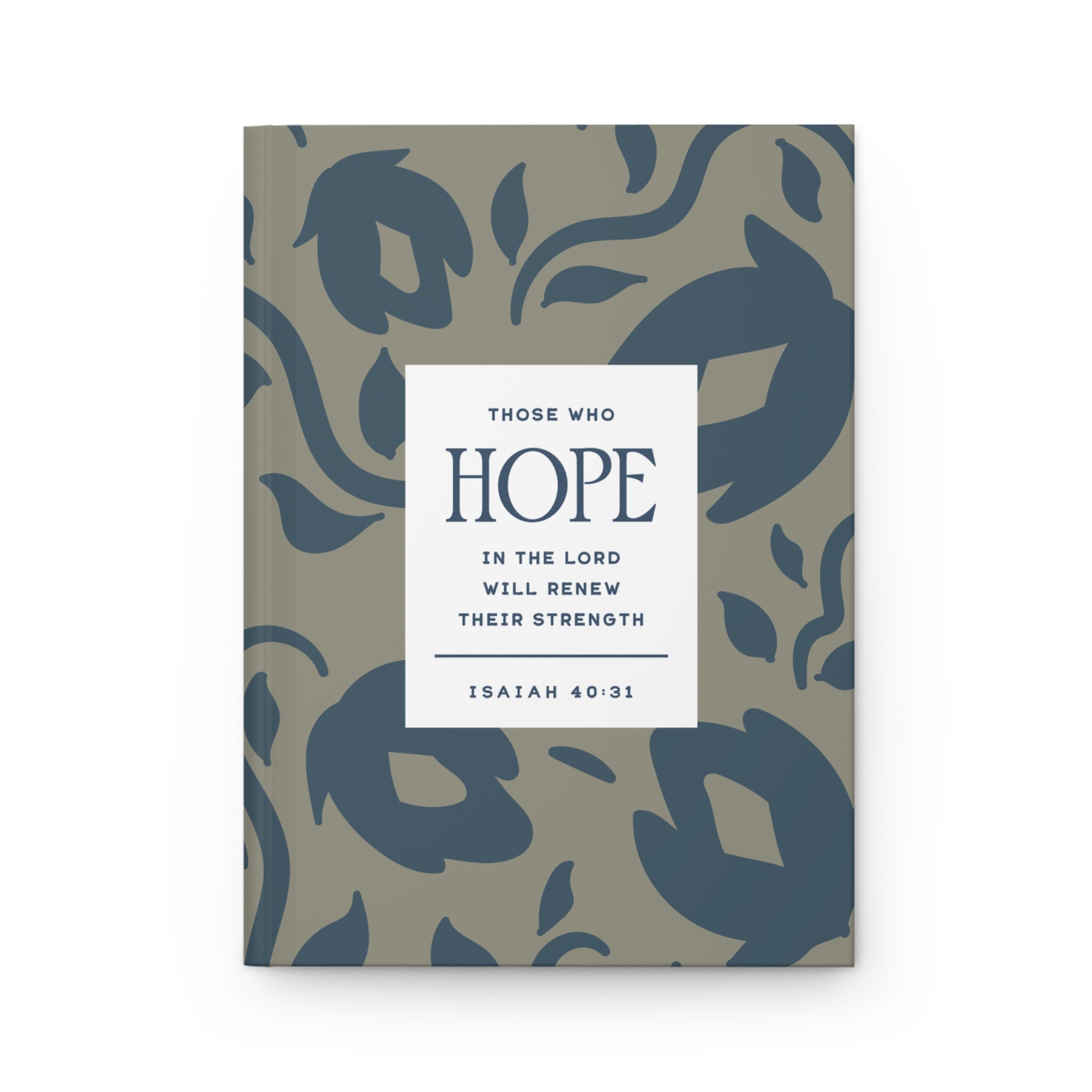 Notebook with decorative cover and motivational quote on a white background