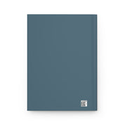 Blue notebook with a QR code on a white background