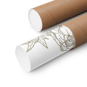 Two rolls of paper with floral designs on a white background