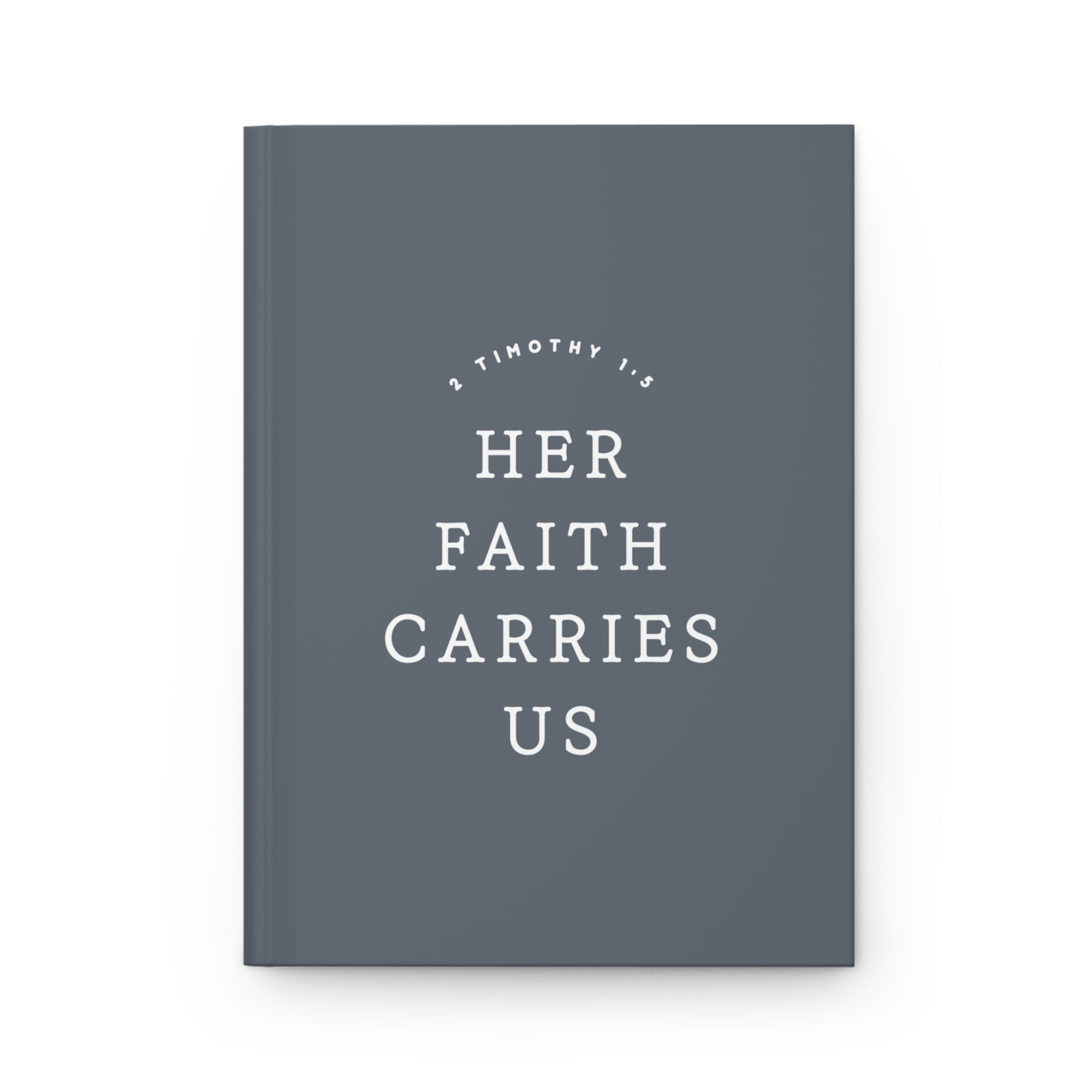 Gray notebook with 'Her Faith Carries Us' text on a white background