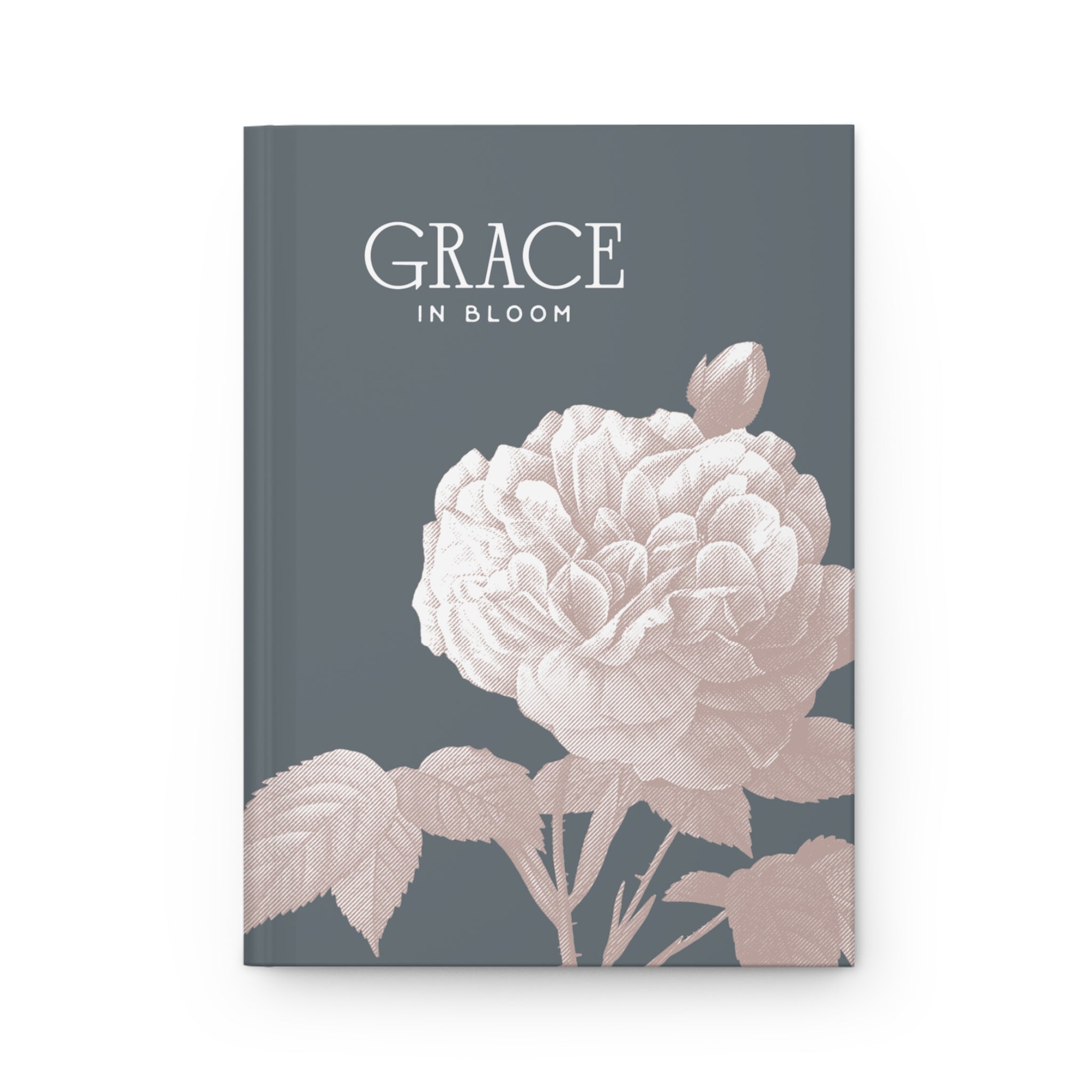 Notebook cover with floral design and 'GRACE IN BLOOM' text on a dark gray background