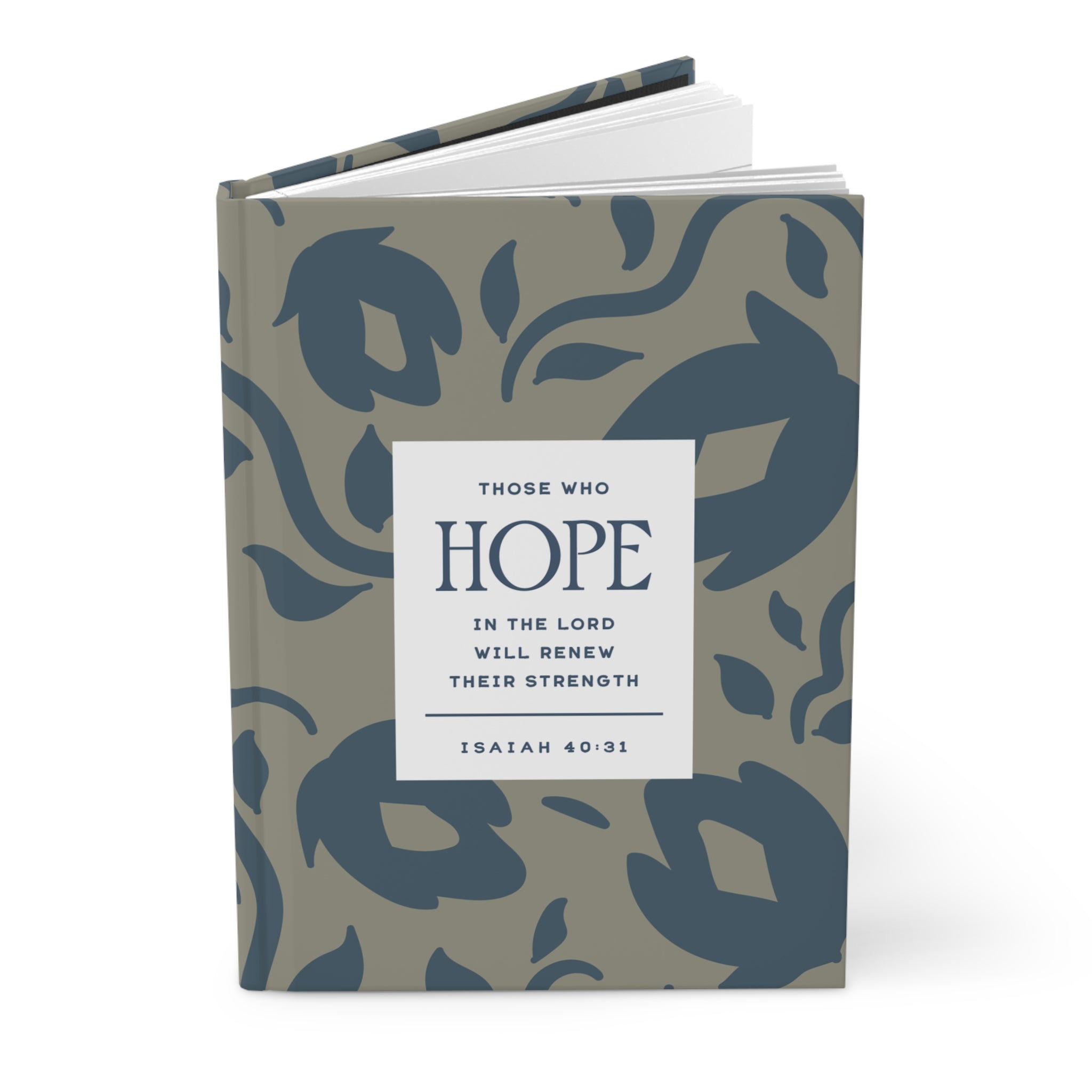 Book with floral pattern and motivational quote on a white background