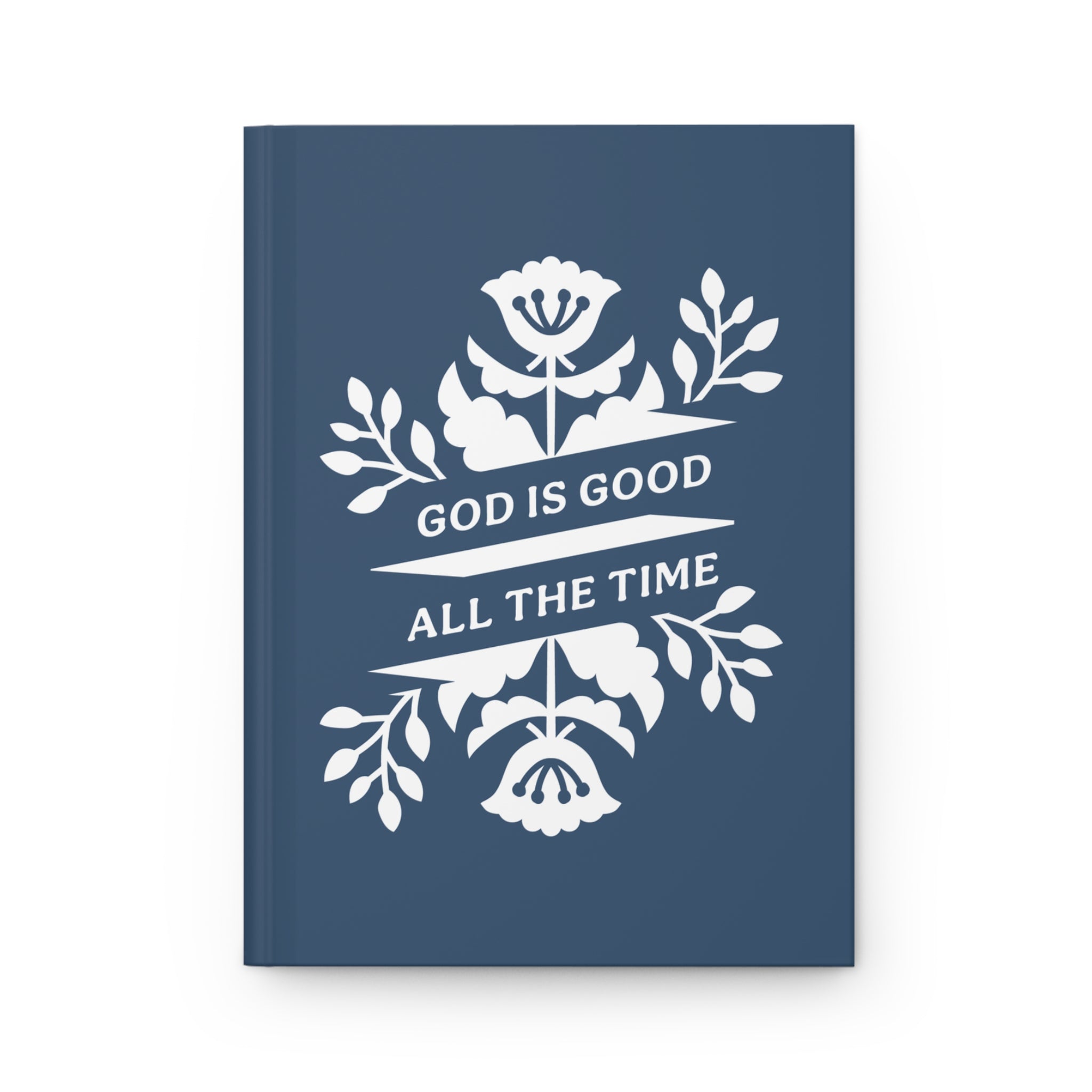 Navy blue notebook with white floral design and 'God is Good All the Time' text