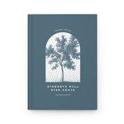 Blue notebook with a tree illustration and motivational quote on a white background