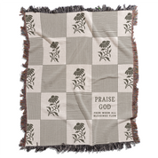 Blanket with floral patterns and 'Praise God' text on a white background