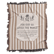 Striped blanket with a central text panel and floral design on a white background