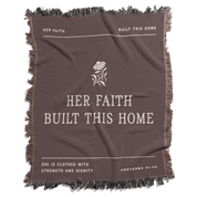Brown blanket with text and floral design on a white background