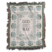 Blanket with 'God Always Makes a Way' text and decorative patterns on a white background