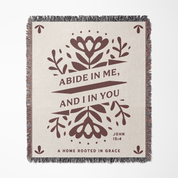 Blanket with floral design and text on a white background