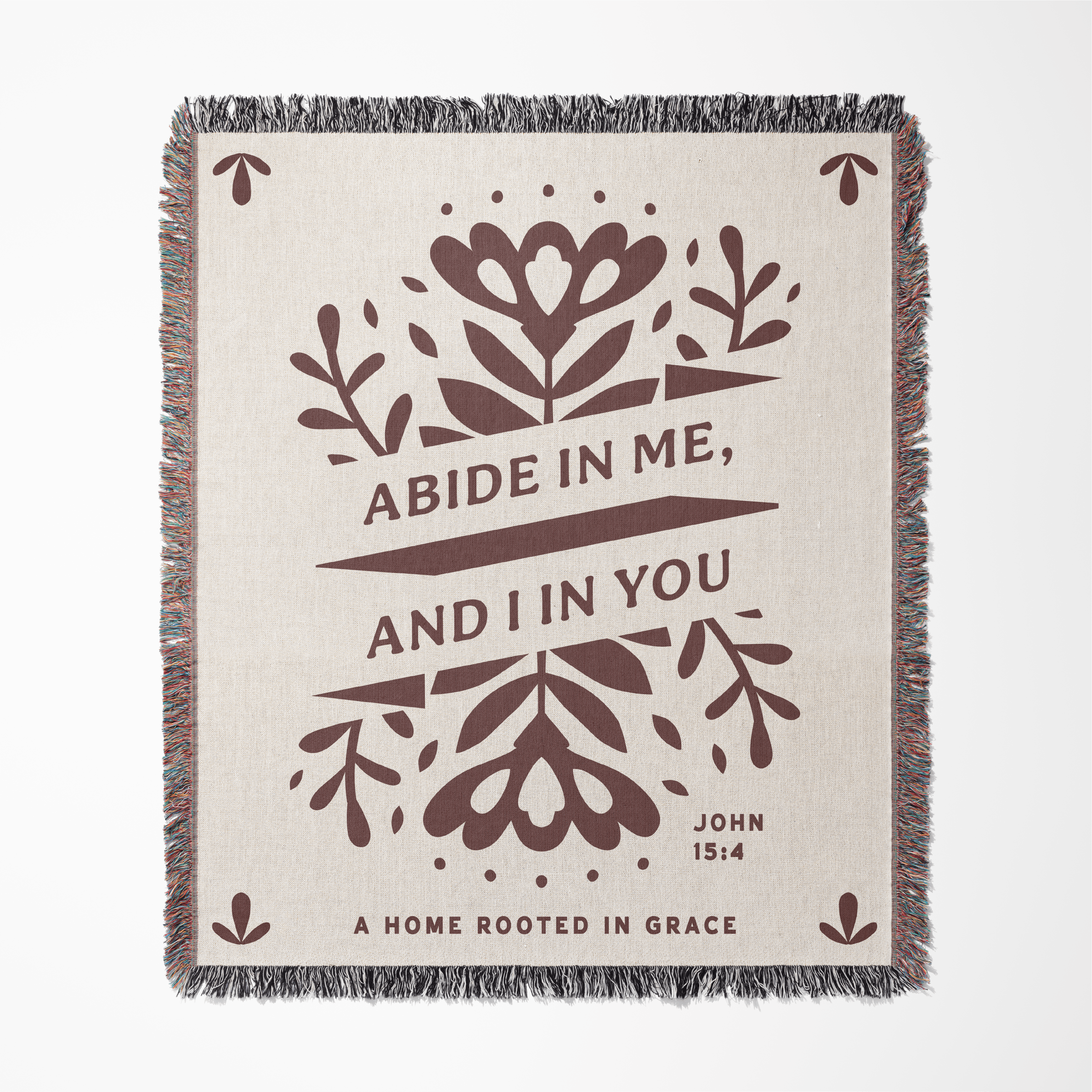 Blanket with floral design and text on a white background