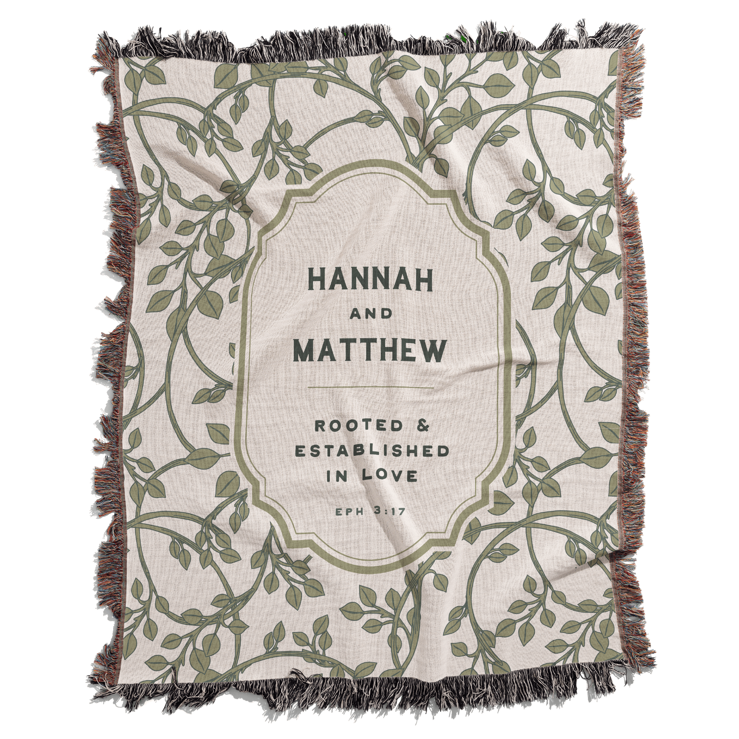 Blanket with 'Hannah and Matthew' text and leaf pattern on a white background