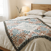 Floral patterned throw blanket on a bed in a bedroom setting