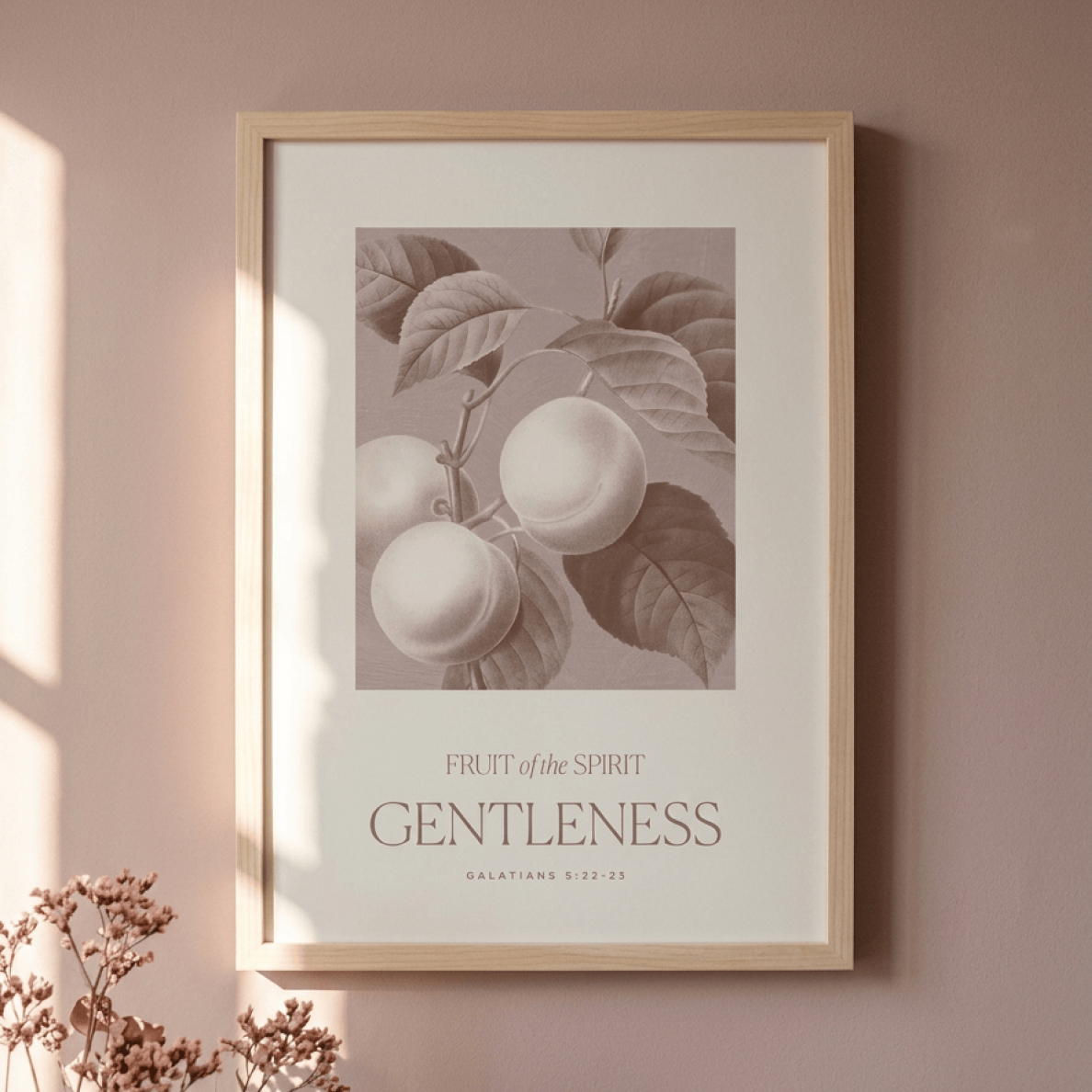 Framed artwork with fruit illustration and text on a wall