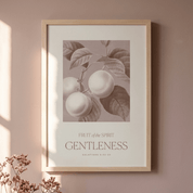 Framed artwork with fruit illustration and text on a wall