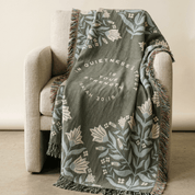 Isaiah 30:15 woven blanket displayed flat showing full botanical scripture design
