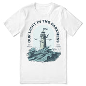 Christian t-shirt with the phrase “Light in the Darkness” in bold typography; unisex faith tee symbolizing hope, truth, and God’s presence in dark times.