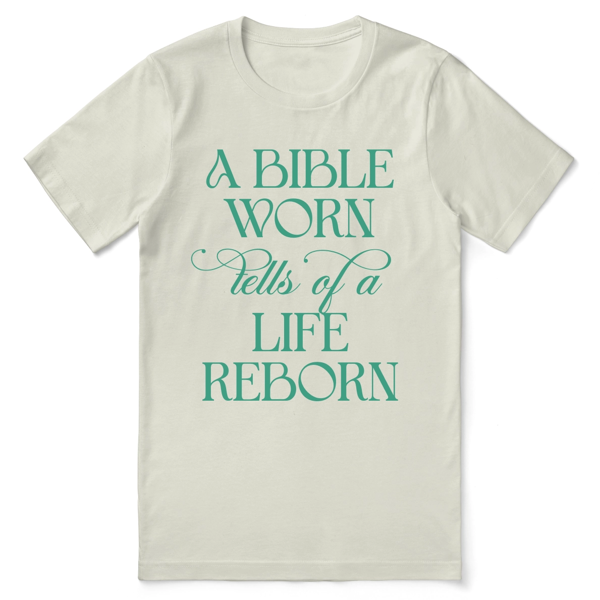Christian t-shirt with the phrase “A Bible Worn Tells of a Life Reborn”; unisex cotton tee celebrating transformation through God's Word.
