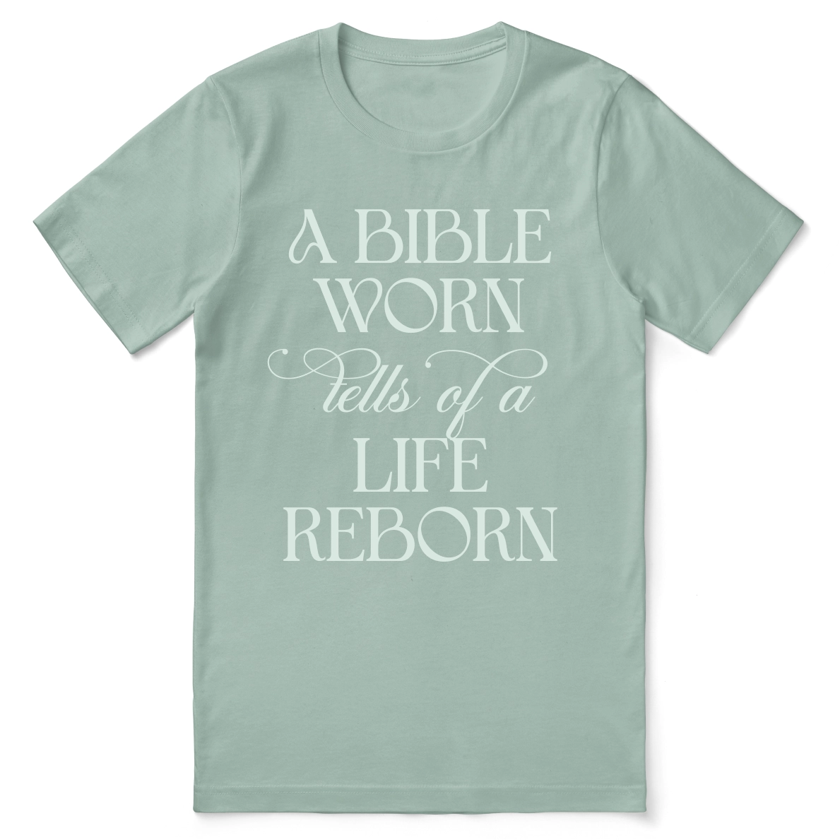 Christian t-shirt with the phrase “A Bible Worn Tells of a Life Reborn”; unisex cotton tee celebrating transformation through God's Word.