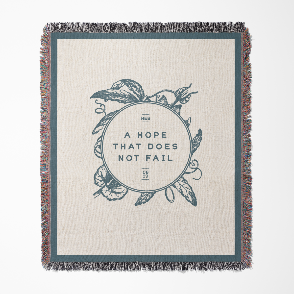 Blanket with text 'Heb 13:5' and decorative elements on a white background