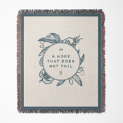 Blanket with text 'Heb 13:5' and decorative elements on a white background