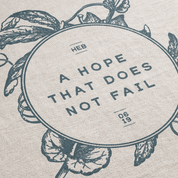 Circular design with text 'A hope that does not fail' and botanical illustrations on a textured background.