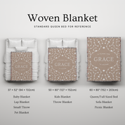 Woven blanket with size options and 'Grace' branding on a light gray background