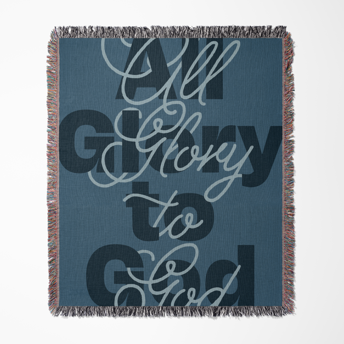 Blanket with 'All Glory to God' text on a blue background