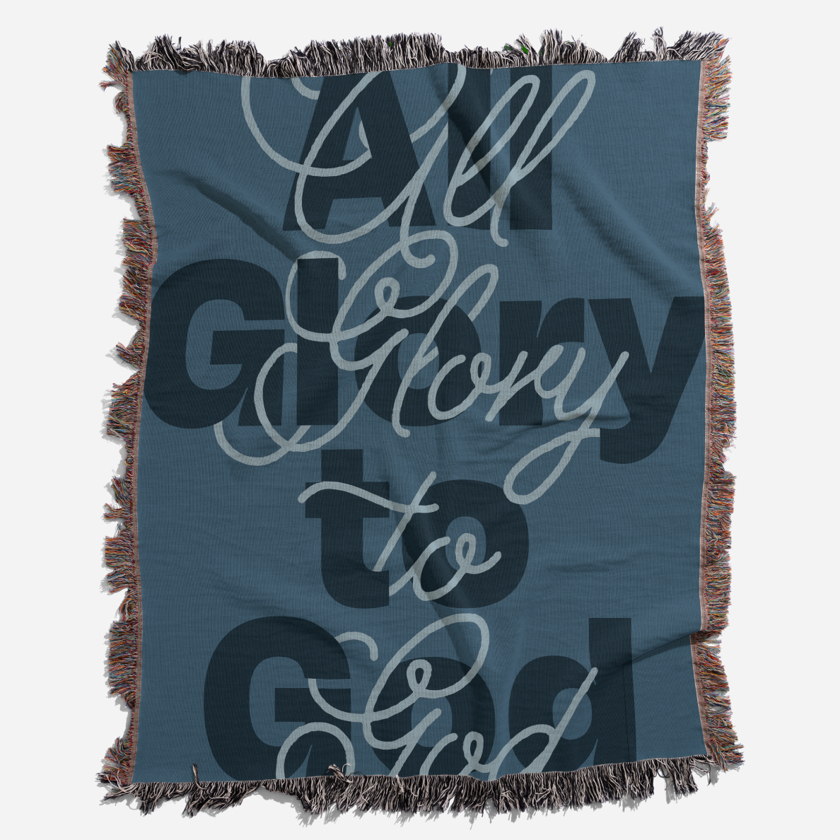 Blanket with 'All Glory to God' text in white on a blue background